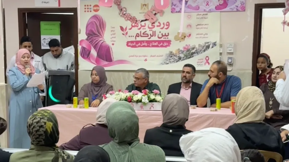 Editorial photograph illustrating Gaza’s ‘pink blooms’ campaign turns breast-cancer awareness into an appeal for access
