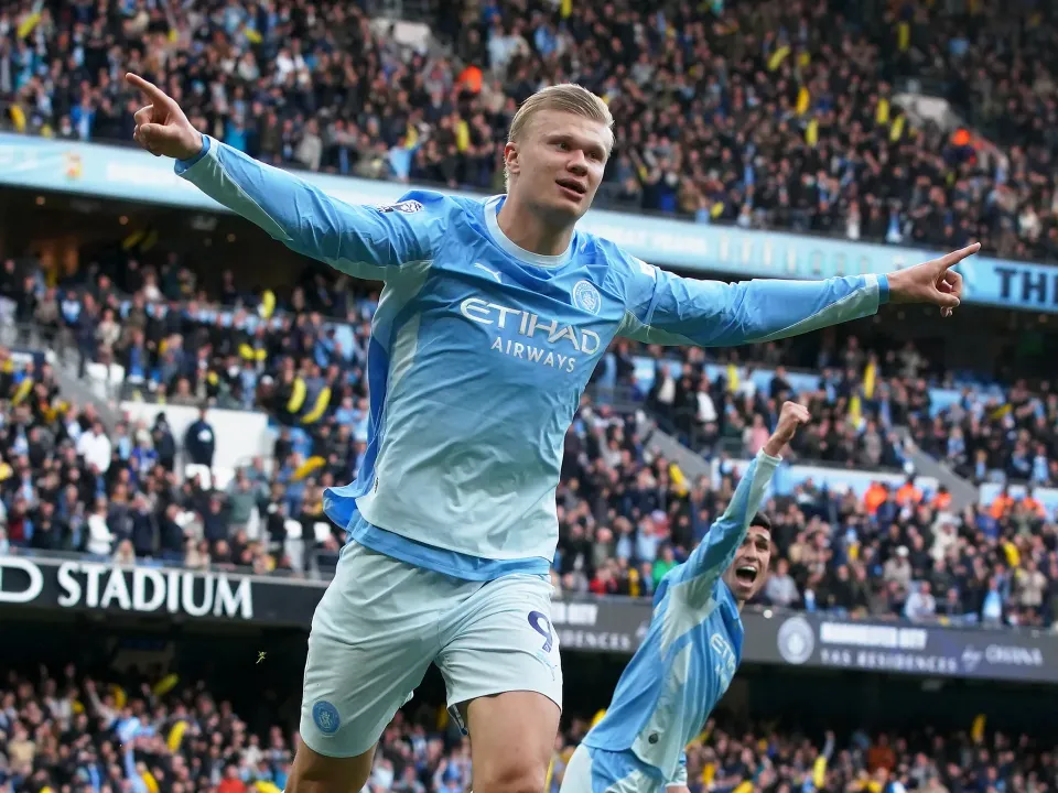 Editorial photograph illustrating Manchester City take perfect Premier League start to Aston Villa