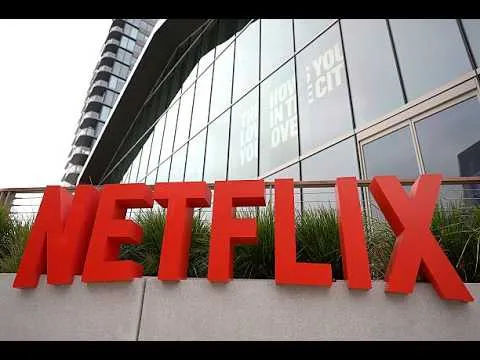 Editorial photograph illustrating Netflix profit beats expectations as advertising forecast dims growth outlook