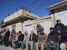 Editorial photograph illustrating Israeli raids and arrests in southern Syria push population to the brink