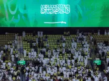 Editorial photograph illustrating Japan FA chief says Saudi security clouds 2027 Asian Cup schedule