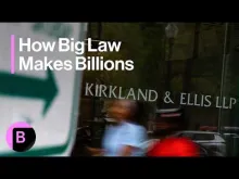 Editorial photograph illustrating AI is testing Big Law’s leverage model, not ending it yet