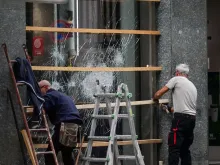 Editorial photograph illustrating Can parents be made to pay for protest damage caused by minors in France and Italy?