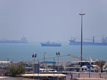 Editorial photograph illustrating Oil reserves can cushion another Hormuz shock, but not replace prolonged Gulf supply losses