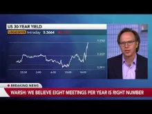 Editorial photograph illustrating Warsh’s AI-rate link broadens the Fed debate without promising an AI backstop