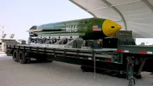 Editorial photograph illustrating What is the ‘Mother of All Bombs’ US could use in Iran?