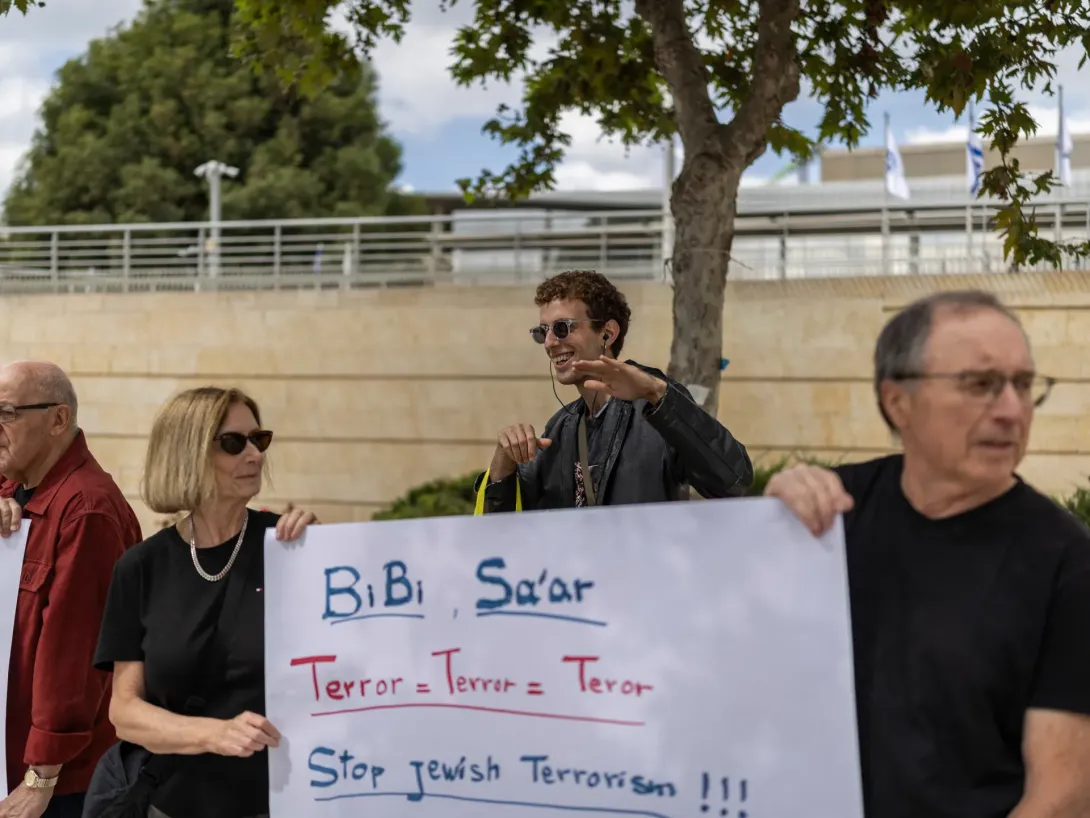 Editorial photograph illustrating Israel arrests 10 in inquiry into West Bank settler attacks on diplomats, journalist
