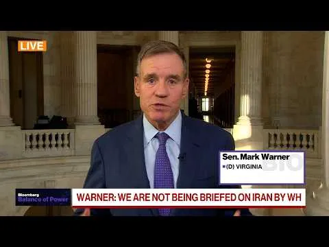 Editorial photograph illustrating Sen. Warner Unaware of U.S. Bomber Relocation Amid Iran Tensions