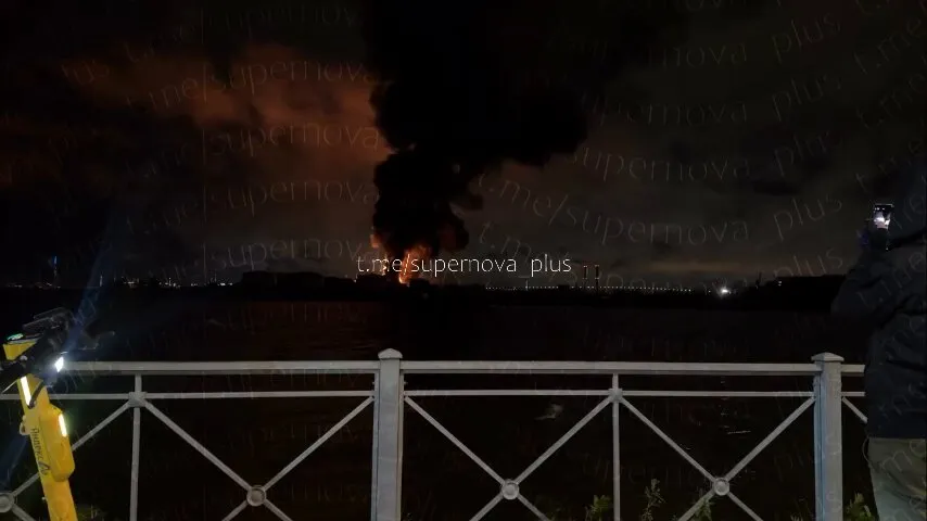 Editorial photograph illustrating Ukrainian drone attack sets St. Petersburg oil terminal ablaze
